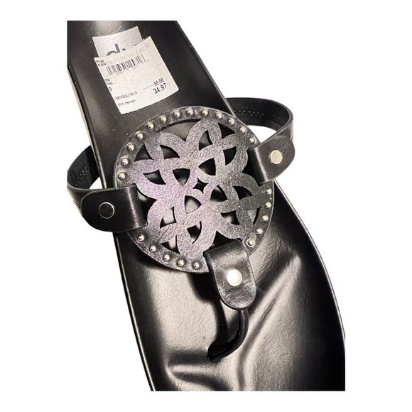 Black leather sandals with silver hardware and decorative cutouts. - Picture 2 of 3